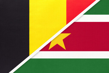 Belgium and Suriname, symbol of two national flags from textile. Championship between two countries.