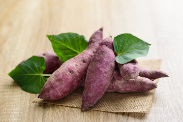 Raw purple sweet potatoes, organic vegetable