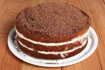 Layer Cake with cream with grated chocolate topping