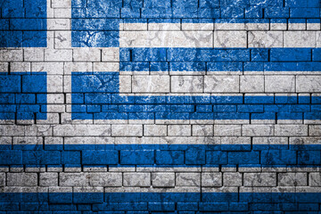 Fototapeta na wymiar National flag of Greece on brick wall background.The concept of national pride and symbol of the country. Flag banner on stone texture background.