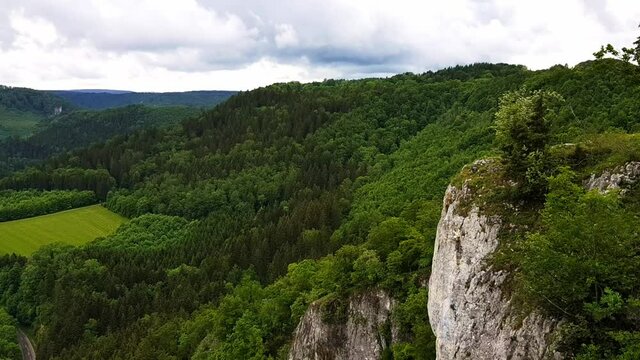 Above static view of rock formation on  mountain side with beautiful landscape in background, Black Forest Germany.