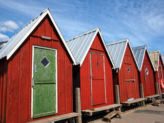 Beautiful red fishing huts on the coast