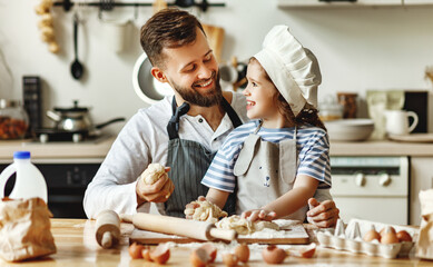 Father and daughter making pastry together