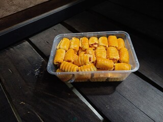 Jam cookies filled with black wood background