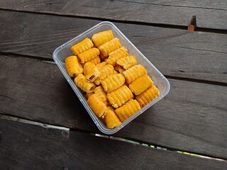 Jam cookies filled with black wood background