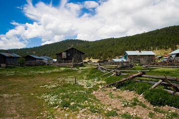 Fototapeta na wymiar landscape of mountain village under blue sky