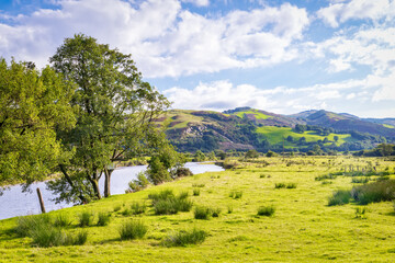 View of river Dulas valley at Bron-yr-aur - south edge of Snowdonia national park in Wales. Copy space in sky.