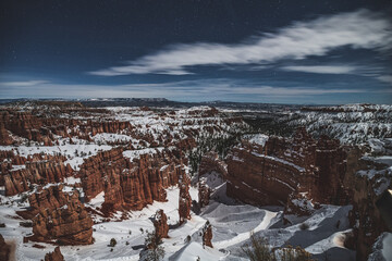 Thor's Hammer covered by snow at Bryce Canyon National Park under Moon light.