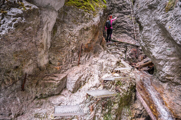 Waterfall with ladder in canyon, sucha bela  in Slovak Paradise, Slovensky Raj National Park,...