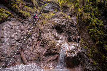 Waterfall with ladder in canyon, sucha bela  in Slovak Paradise, Slovensky Raj National Park, Slovakia - obrazy, fototapety, plakaty
