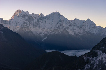 Obraz na płótnie Canvas Beautiful landscape of Himalaya mountains including Kangtega and Thamserku in a morning sunrise view from Gokyo Ri view point, Nepal