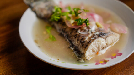 Steamed Rohu fish in Lemon sauce.