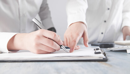 Fototapeta premium Business people signing contract. Business concept