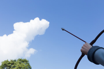 bow and arrow point to clouds look like monster