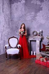 woman in red dress sitting on chair