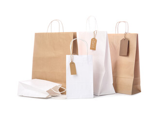 Paper shopping bags on white background