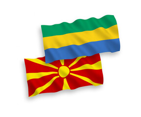Flags of Gabon and North Macedonia on a white background