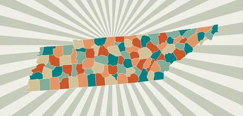 Tennessee map. Poster with map of the us state in retro color palette. Shape of Tennessee with sunburst rays background. Vector illustration.