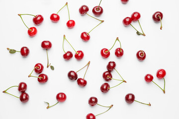 Obraz na płótnie Canvas Ripe sweet cherry on white background