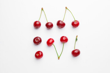 Ripe sweet cherry on white background