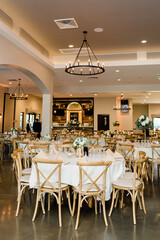 Banquet hall being prepared for a wedding reception