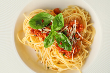 Tasty pasta bolognese on plate, closeup