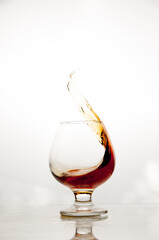 splash in a glass of brandy