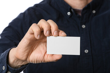 Man with blank business card, closeup