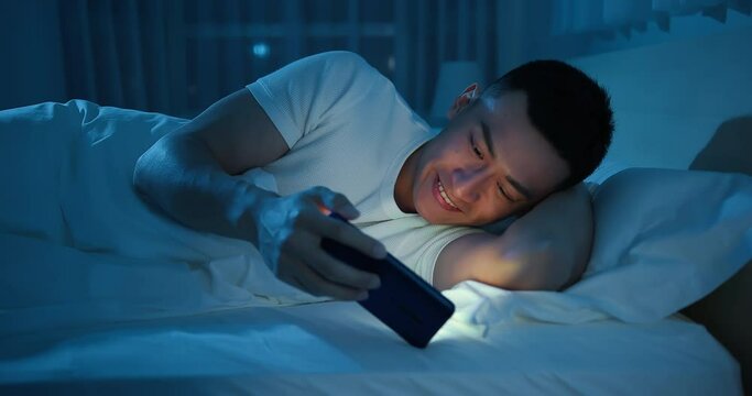man watch video on smartphone