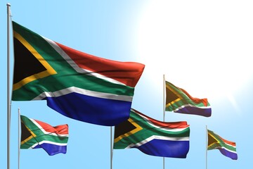 Obraz premium wonderful day of flag 3d illustration. - 5 flags of South Africa are wave on blue sky background