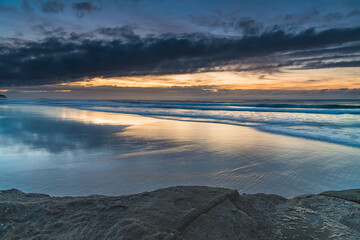 Sunrise Seascape with Clouds and Ships on the Horizon