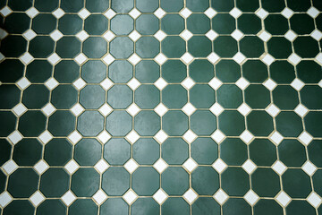 Close up texture and mosaic pattern of green wall and floor hexagonal porcelain tiles