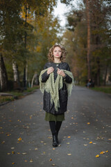 young woman in autumn park