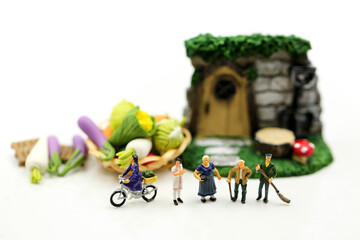 Miniature people : Farmer with  agricultural product at farmer market