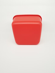 colorful plastic container over white background