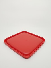 colorful plastic container over white background