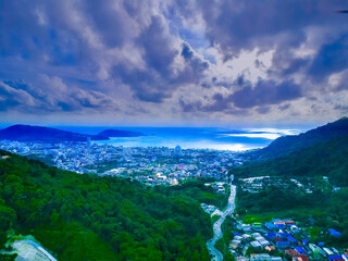 Aerial Drone view of Patong city and beach and Patong Hills