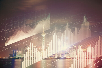 Financial graph on night city scape with tall buildings background multi exposure. Analysis concept.