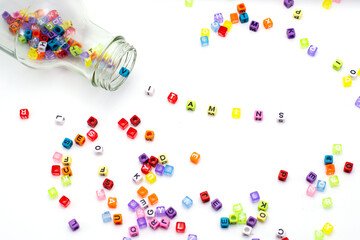 Multicolored bead shape to vitamins alphabet