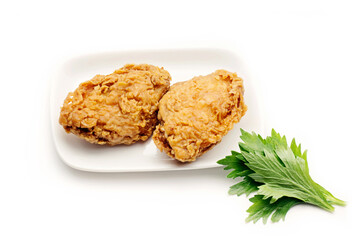 fried chicken nuggets on white plate