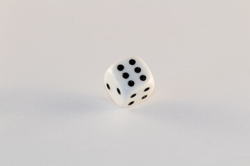 White dice on a white background