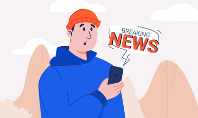 Guy with shocked face holding smartphone with breaking news notification bubble. Young man in hoodie and knitted hat surprised and confused with latest tidings walking in the park. Information stress.