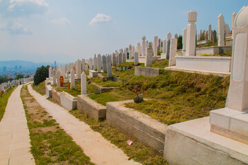 Martyrs’ Cemetery Kovaci:
White graves of the muslim graveyard on the hill above the city. Total number of deaths during the Bosnian War (1992-1995) was 110,000 people
