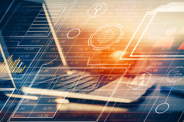 Double exposure of desktop computer and technology theme hologram. Concept of software development.