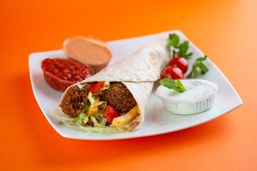 Falafel sandwich on a dish