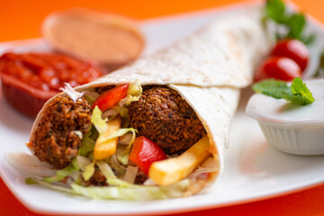 Falafel sandwich on a dish