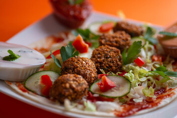 Falafel sandwich on a dish