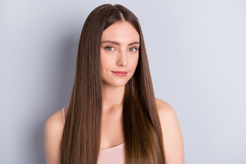 Obraz na płótnie Canvas Closeup photo of attractive cute perfect appearance model lady demonstrating ideal neat long healthy hairstyle after salon wear beige singlet isolated grey color background