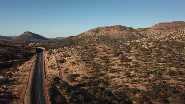 4K aerial drone video of Africa savanna hills, mansions and houses up n the mountains south of Windhoek in central highland Khomas Hochland of Namibia, southern Africa