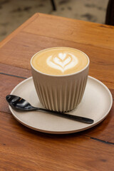 Oat flat white in bamboo cup